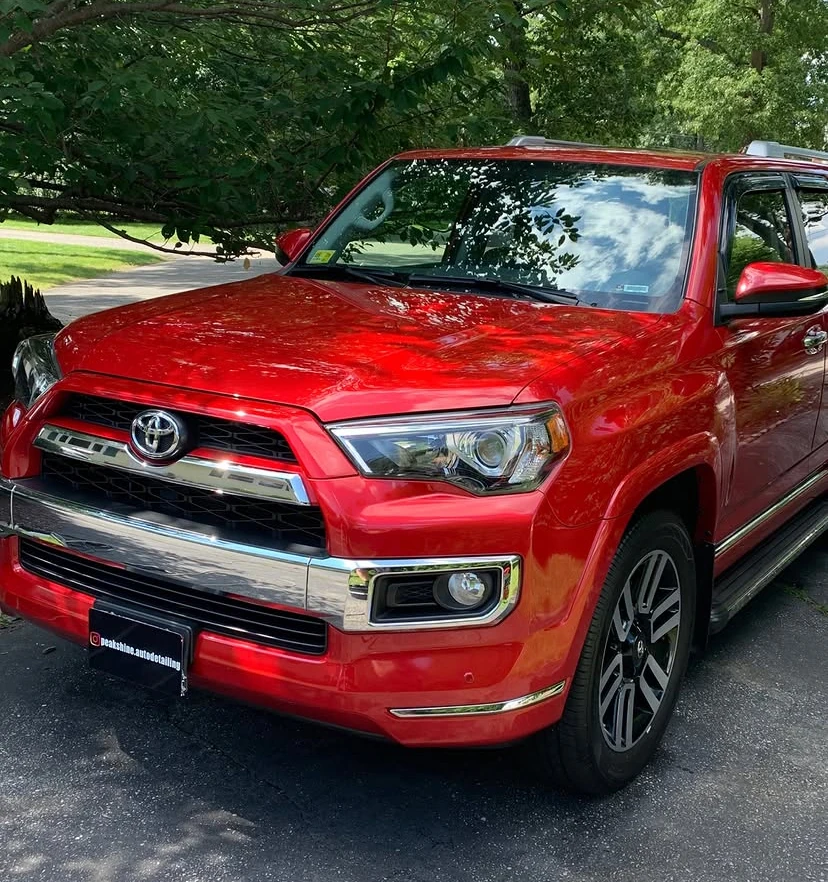 Red Toyota 4Runner after a Peak Shine detail